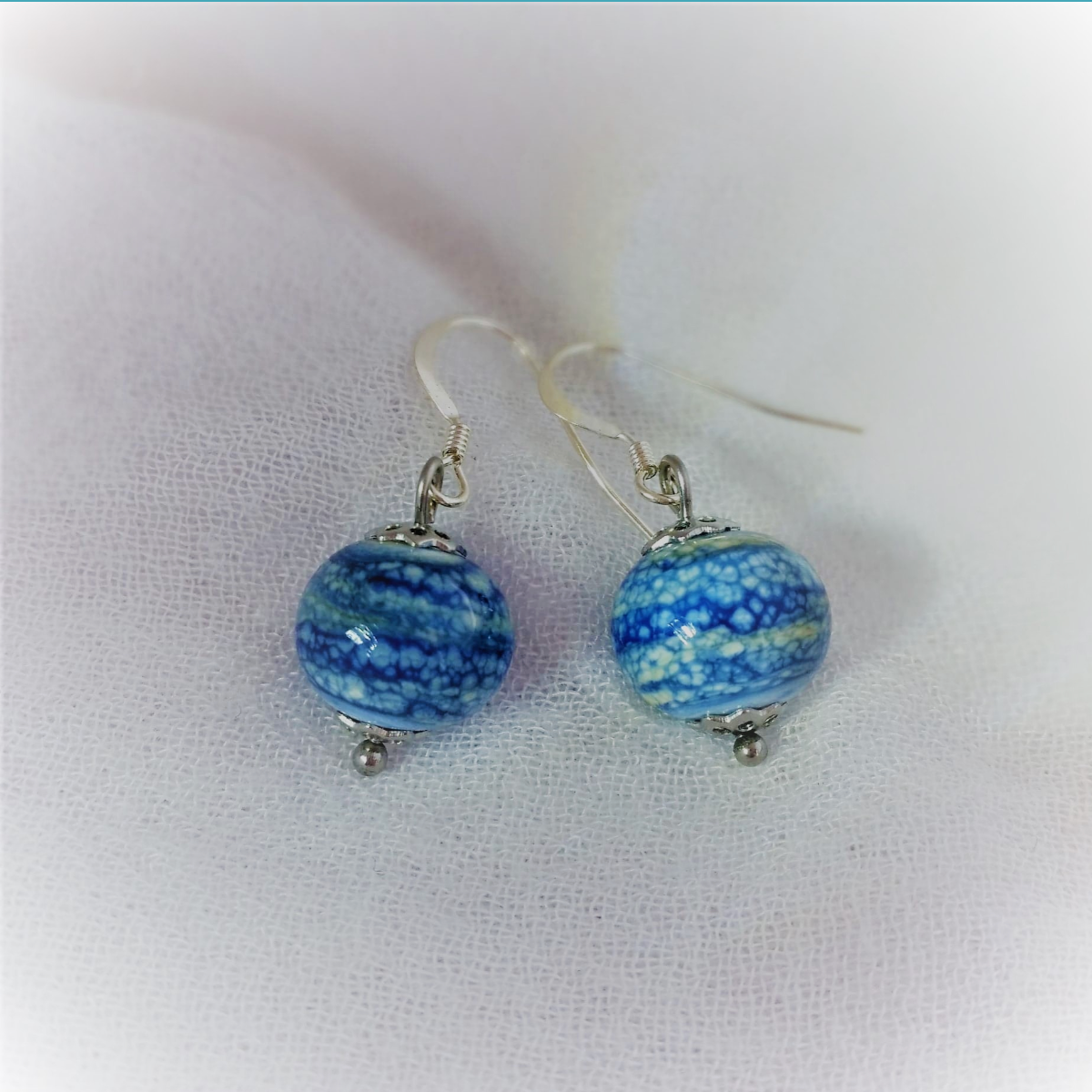 Boucles d’oreilles flots